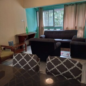 Living Room in 1 BHK Apartment at Tulip CHS, Kalyani Nagar – for Rent