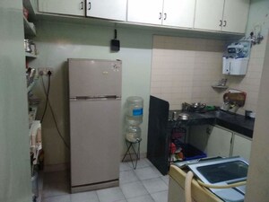 Kitchen in 1 BHK Apartment at Tulip CHS, Kalyani Nagar – for Rent