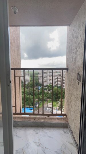 Balcony in 1 BHK Apartment at Metropolis Bayside, Kasarvadavali – for Rent