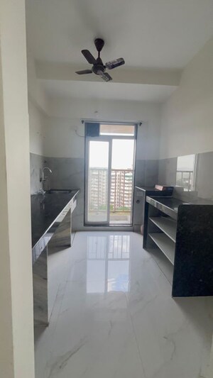 Kitchen in 1 BHK Apartment at Metropolis Bayside, Kasarvadavali – for Rent