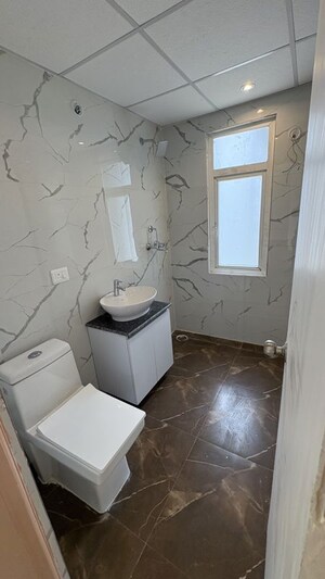 Bathroom in 3 BHK Apartment at Ahinsa Khand 2 – for Rent