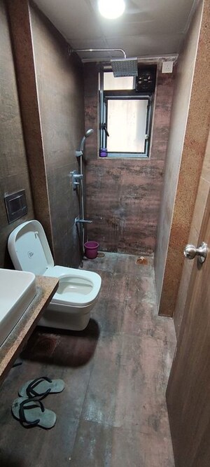 Bathroom in 3 BHK Apartment at Nav Palmyra Apartment, Khar West – for Rent