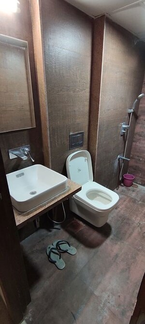 Bathroom in 3 BHK Apartment at Nav Palmyra Apartment, Khar West – for Rent