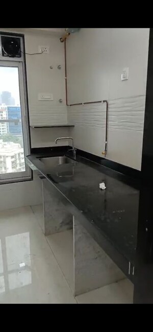 Kitchen in 2 BHK Apartment at Triumph Swastik, Malad West – for Sale