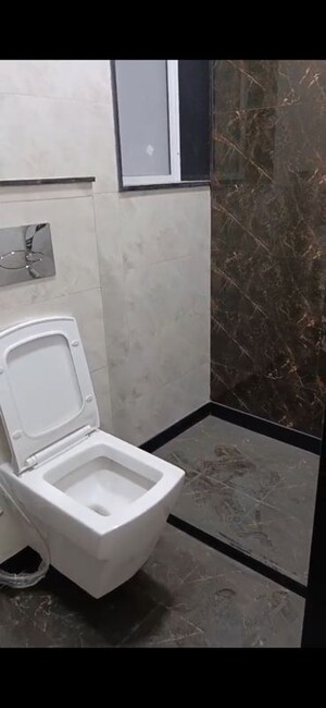 Bathroom in 2 BHK Apartment at Triumph Swastik, Malad West – for Sale