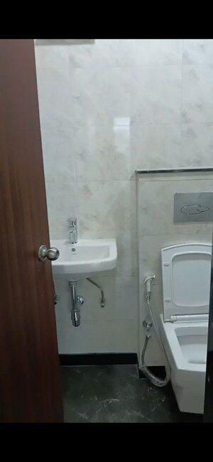 Bathroom in 2 BHK Apartment at Triumph Swastik, Malad West – for Sale