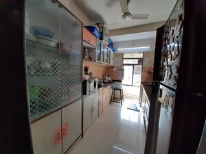 Kitchen in 3 BHK Apartment at Satellite Garden, Goregaon East – for Rent