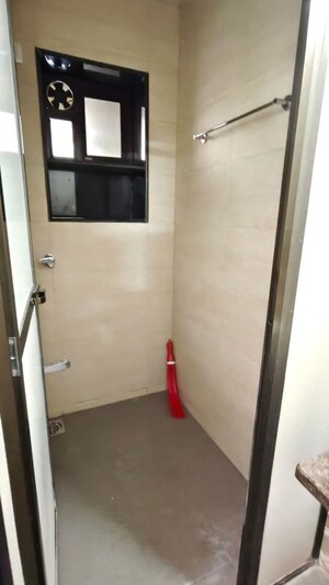 Bathroom in 1 BHK Apartment at Lalani Valentine Apartment, Malad East – for Rent