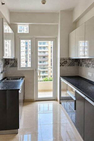 Kitchen in 4 BHK Apartment at Trident Embassy, Sector 1 Greater Noida – for Sale