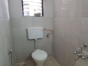 Bathroom in 2 BHK Apartment at Gurukrupa Astter, Wadgaon Sheri – for Rent