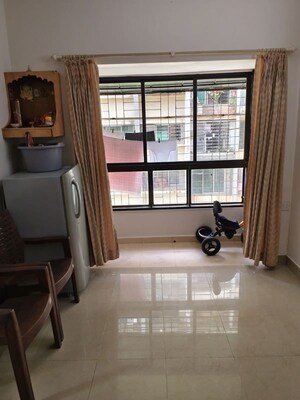 Living Room in 1 BHK Apartment at Lokhandwala Infrastructure Spring Leaf, Kandivali East – for Rent