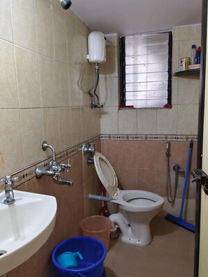 Bathroom in 1 BHK Apartment at Lokhandwala Infrastructure Spring Leaf, Kandivali East – for Rent