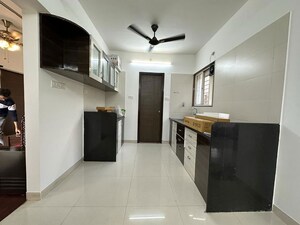 Kitchen in 2 BHK Apartment at Shree Venkatesh Graffiti Glover, Keshav Nagar – for Sale