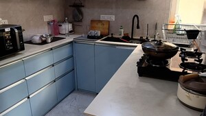 Kitchen in 4 BHK Apartment at Mahagun Moderne, Sector 78 – for Sale