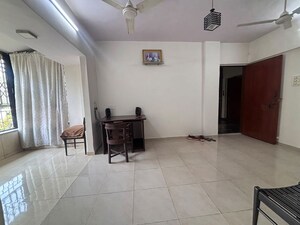 Living Room in 1 BHK Apartment at Dosti Group Maitri Gardens, Oswal Park – for Rent