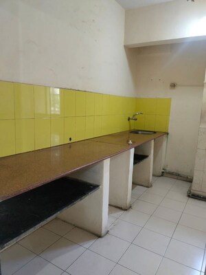 Kitchen in 1 BHK Apartment at Vijay Nagari Annex, Waghbil – for Sale