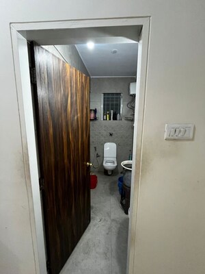Attached Bathroom in 1 BHK Apartment at Satish Dham CHS, Charai – for Rent