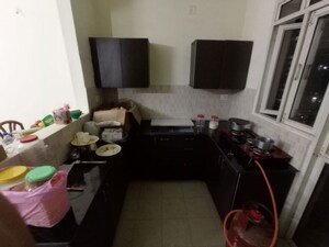 Kitchen in Studio Apartment at Assotech Windsor Court, Sector 78 – for Rent
