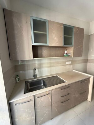 Kitchen in 2 BHK Apartment at Soham Crystal Spires, Thane West – for Rent