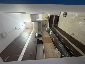 Kitchen in 2 BHK Apartment at Ajnara Grace, Raj Nagar Extension – for Rent
