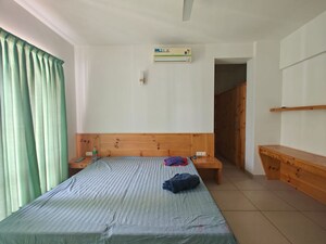 Bedroom in 4 BHK Apartment at Marvel Zephyr, Kharadi – for Rent