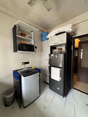 Kitchen in 2 BHK Apartment at Mukta Apartment 10th Main, Khar West – for Rent