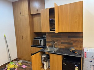 Kitchen in Studio Apartment at Gaur City Center, Sector 4 Greater Noida – for Rent