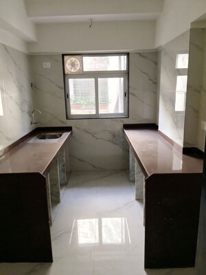 Kitchen in 3 BHK Apartment at Varuna Vasundhara Apartment, Santacruz West – for Rent