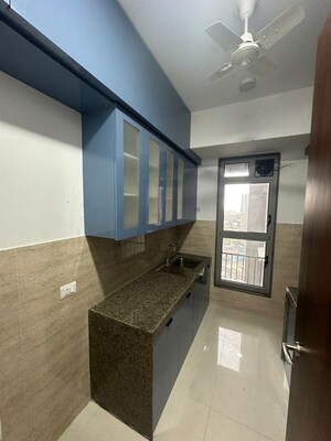 Kitchen in 4 BHK Apartment at Oberoi Sky City, Borivali East – for Rent