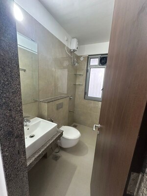 Bathroom in 3 BHK Apartment at Oberoi Sky City, Borivali East – for Rent