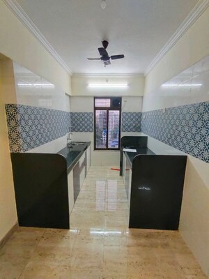 Kitchen in 1 BHK Apartment at Shree Sai D N Nagar Shivneri CHS Ltd, Andheri West – for Rent