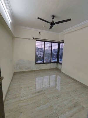Bedroom in 1 BHK Apartment at Shree Sai D N Nagar Shivneri CHS Ltd, Andheri West – for Rent