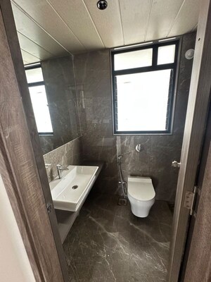 Bathroom in 2 BHK Apartment at Mahindra Centralis Tower 3, Pimpri – for Rent