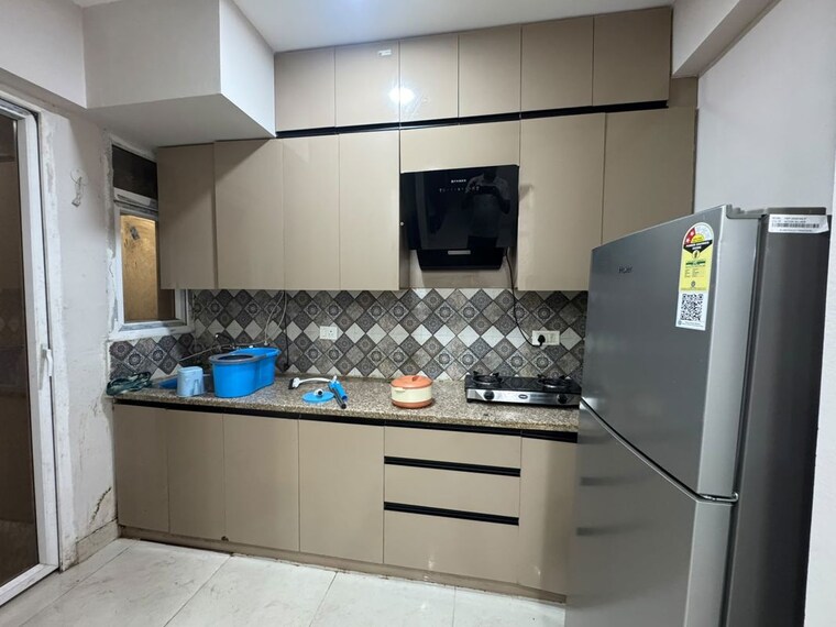 Kitchen, signature-global-the-millennia 2 Bedroom 644 Sq.Ft. Apartment In Sector 37d Gurgaon 10658867