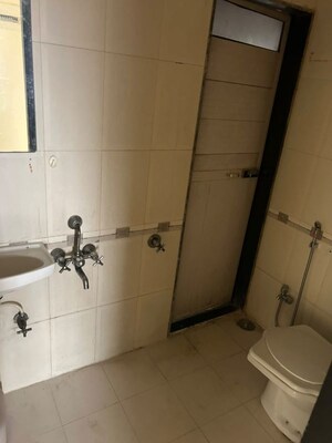Attached Bathroom in 1 BHK Apartment at Dheeraj Solitaire, Malad West – for Rent