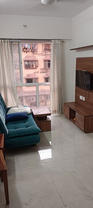Living Room in 1 BHK Apartment at Shakti Aura, Ghansoli – for Rent