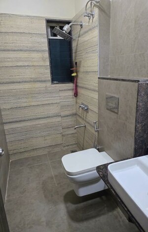 Bathroom in 2 BHK Apartment at Siddhi Highland Haven, Balkum Pada – for Rent