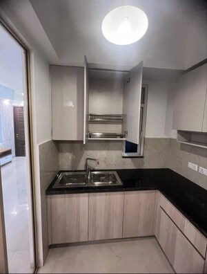 Kitchen in 3 BHK Apartment at Smart World Orchard, Sector 61 – for Rent
