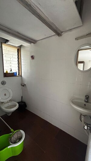 Bathroom in 2 BHK Apartment at Manish Tower, Andheri West – for Rent