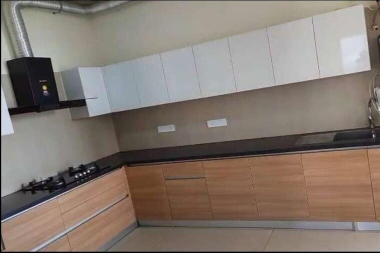 Kitchen, maya-green-lotus-saksham 3 Bedroom 1346 Sq.Ft. Apartment In International Airport Road Zirakpur 10659180