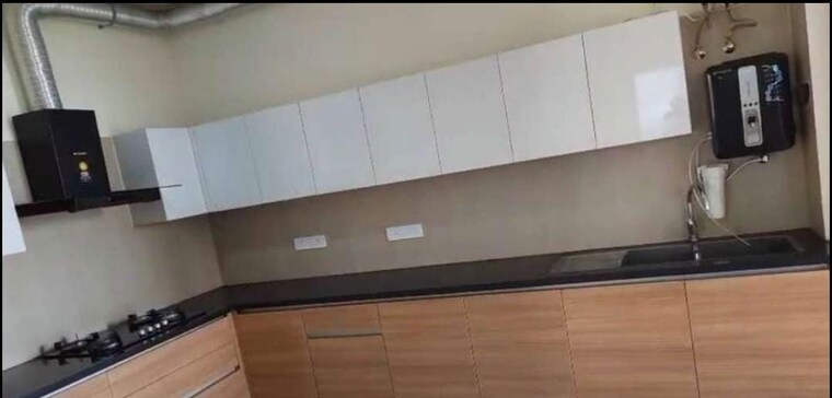 Kitchen, maya-green-lotus-saksham 3 Bedroom 1346 Sq.Ft. Apartment In International Airport Road Zirakpur 10659180