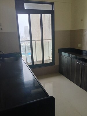 Room in 2 BHK Apartment at Rustomjee Elanza, Malad West – for Rent