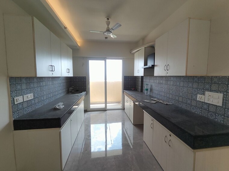 Kitchen, tulip-yellow 3 Bedroom 1704 Sq.Ft. Apartment In Sector 69 Gurgaon 10659224