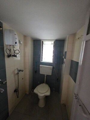 Bathroom in 2 BHK Apartment at Aastha Heights, Goregaon West – for Sale