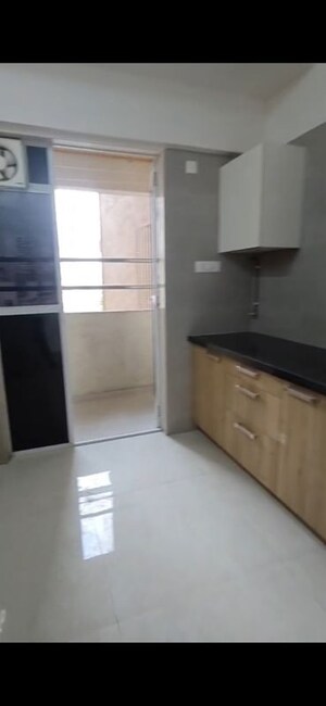 Kitchen in 2 BHK Apartment at Millennium Court, Andheri West – for Rent