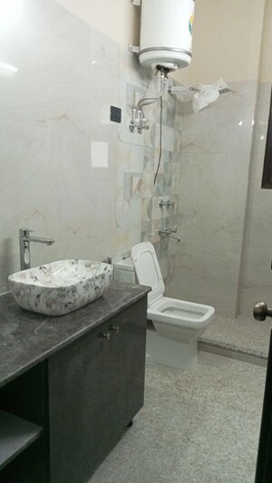 Bathroom in 4 BHK Builder Floor at Lajpat Nagar – for Rent