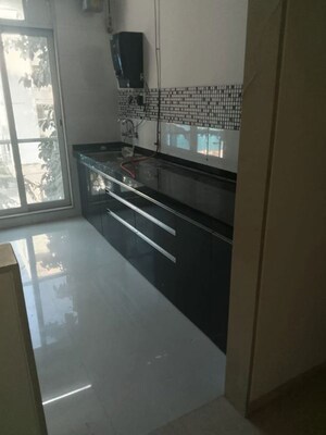 Kitchen in 2 BHK Apartment at Can Rose Villa, Amboli – for Rent