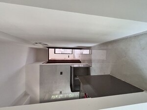 Kitchen in 2 BHK Apartment at Aadhunik Madhumas CHS, Borivali West – for Sale