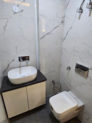 Bathroom in 4 BHK Builder Floor at Rajouri Garden – for Rent