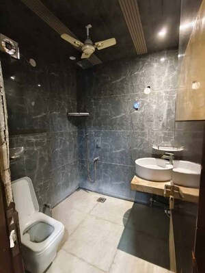 Bathroom in 4 BHK Builder Floor at Rajouri Garden – for Rent